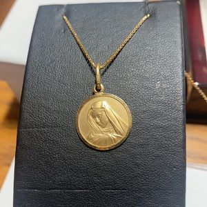 10k Medallion pendant imported from Italy..